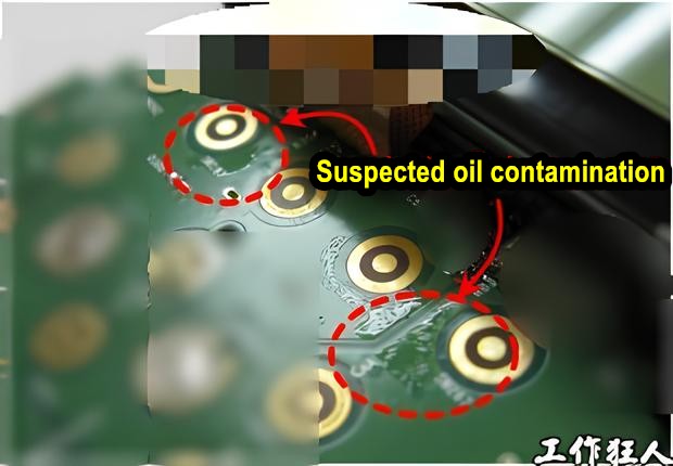 Suspected oil contamination on PCB around keypad.